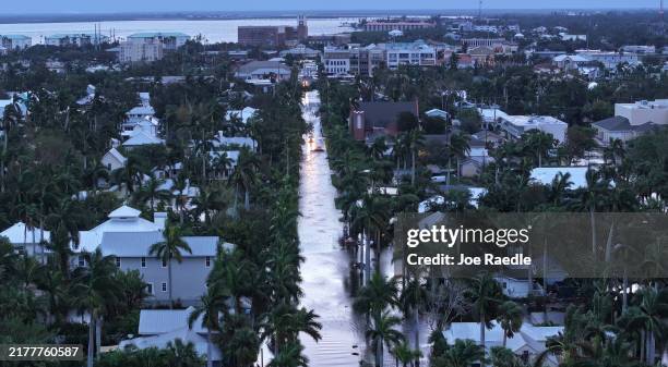 In this aerial view, Flood waters inundate a neighborhood after Hurricane Milton came ashore on October 10 in Punta Gorda, Florida. The storm made...