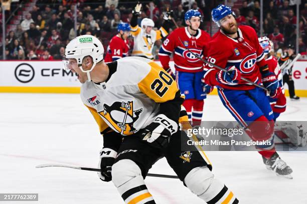 Lars Eller of the Pittsburgh Penguins reacts after scoring a goal during the first period against the Montreal Canadiens at the Bell Centre on...