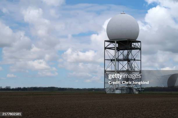 doppler weather radar on airport land - weather radar stock pictures, royalty-free photos & images