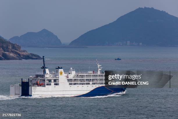 Passenger ferry sails off the coast of Nangan Township, in the Matsu Islands on October 15 a day after China conducted the "Joint Sword-2024B"...