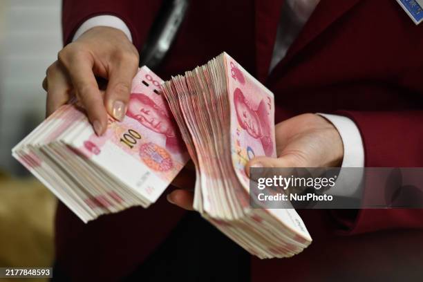 13 Rmb 13 Cash Handling Employee Stock Photos, High-Res Pictures, and Images ...