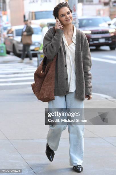 Katie Holmes is seen on her way to the theatre in jeans and a Dune London bag on October 10, 2024 in New York City.
