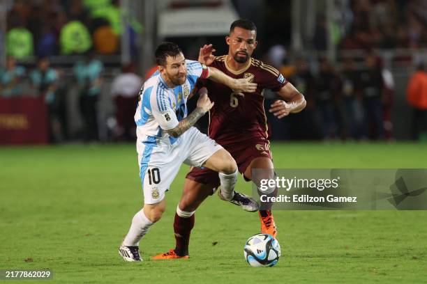 Lionel Messi of Argentina and Yangel Herrera of Venezuela battle for the ball during the FIFA World Cup 2026 South American Qualifier match between...