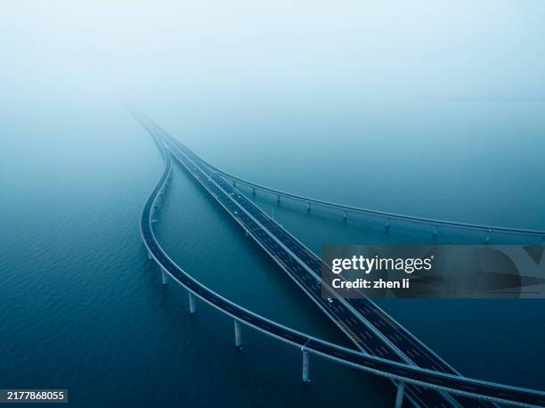 sea crossing bridge - long bridge stock pictures, royalty-free photos & images