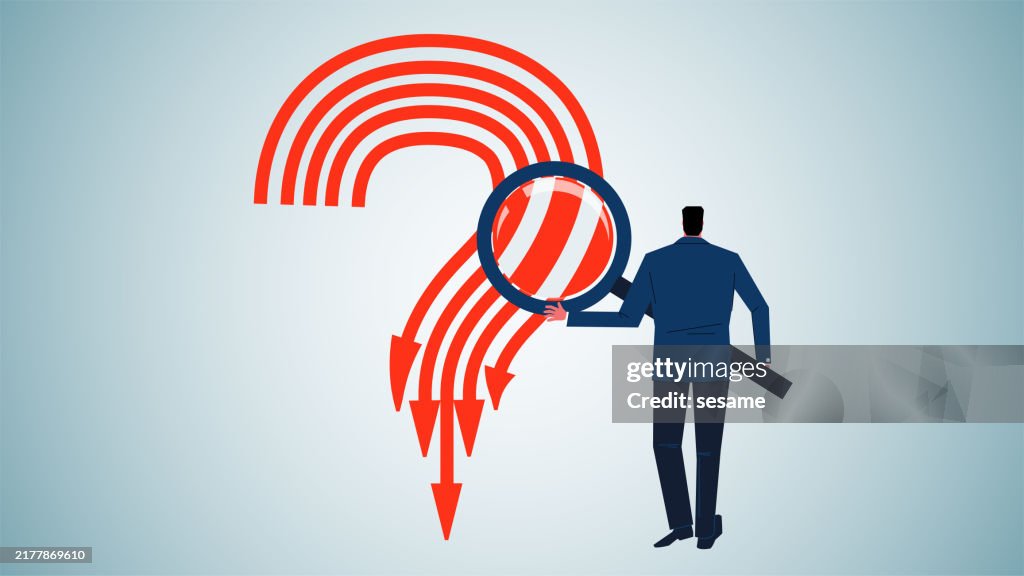 businessman analyzing the cause of the decrease ... Analyzing The Causes Of Decline Or Recession Identifying The Causes Of ...