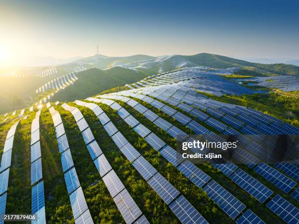 aerial view of solar power panels in the hill - solar panel stock pictures, royalty-free photos & images
