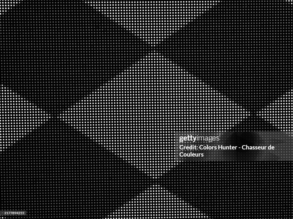 Close-up of black and white diamonds shape on a LED screen. London, England, United kingdom. Natural light.