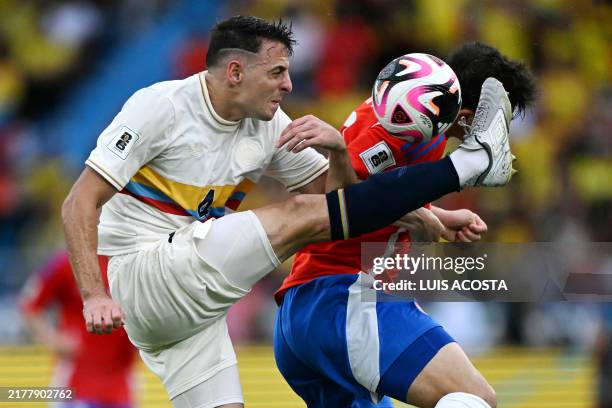 Colombia's defender Santiago Arias and Chile's forward Gonzalo Tapia fight for the ball during the 2026 FIFA World Cup South American qualifiers...