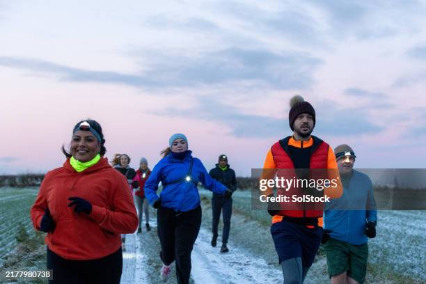 running is better together - dirt track stock pictures, royalty-free photos & images