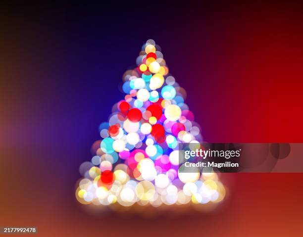 blurred christmas tree lights in soft bokeh effect on dark background - rainbow glitter background stock illustrations