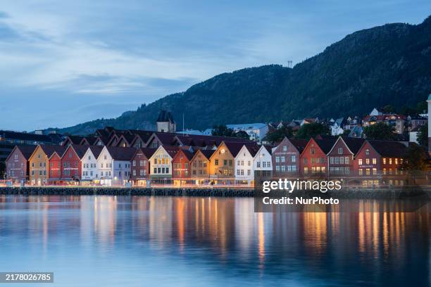 View of Bryggen, the historic Hanseatic Wharf in Bergen, Norway, at night, on September 16, 2024. Bryggen, a UNESCO World Heritage site, is one of...
