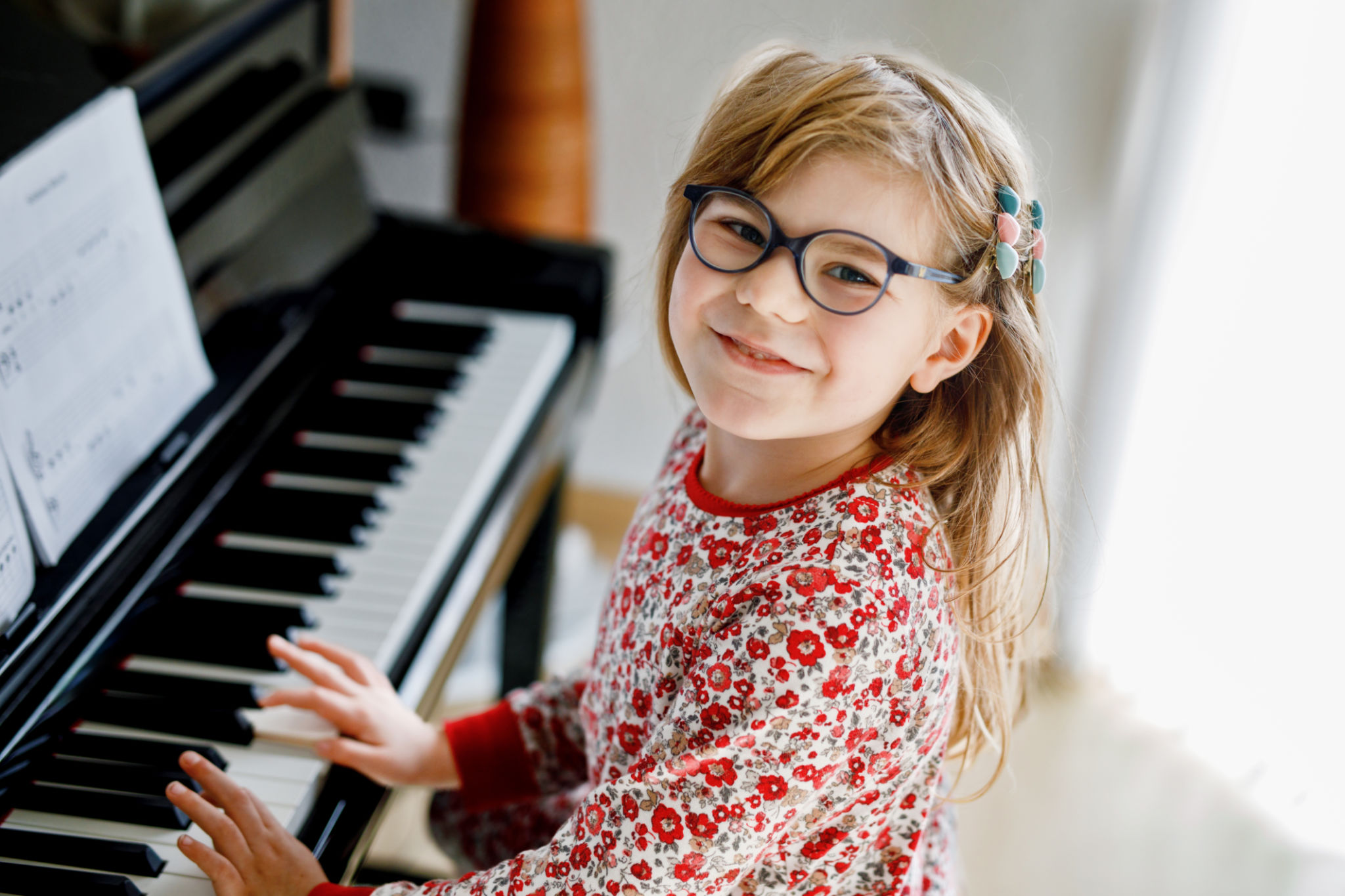 children practicing piano