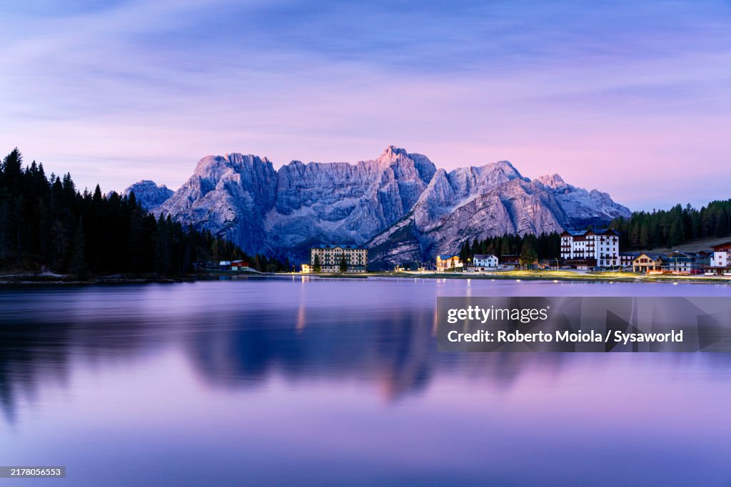 Fiery sky at dawn over Lake Misurina, Dolomites