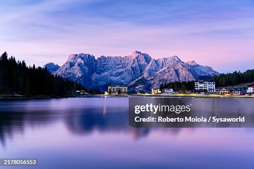 Fiery sky at dawn over Lake Misurina, Dolomites Fiery sky at dawn over Lake Misurina, Dolomites
