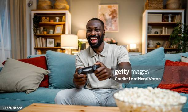 video games night at home - computer game control stock pictures, royalty-free photos & images