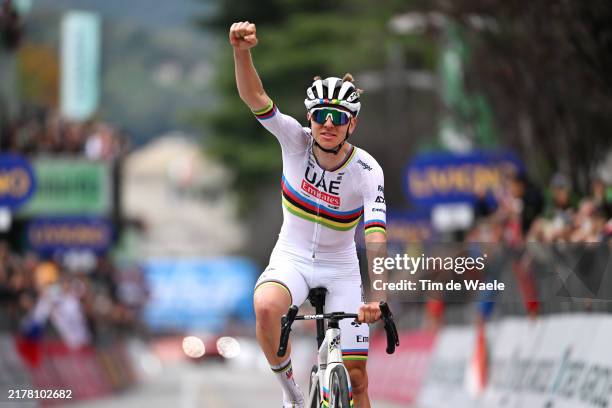 Tadej Pogacar of Slovenia and UAE Team Emirates celebrates at finish line as race winner during the 118th Il Lombardia 2024 a 255km one day race from...