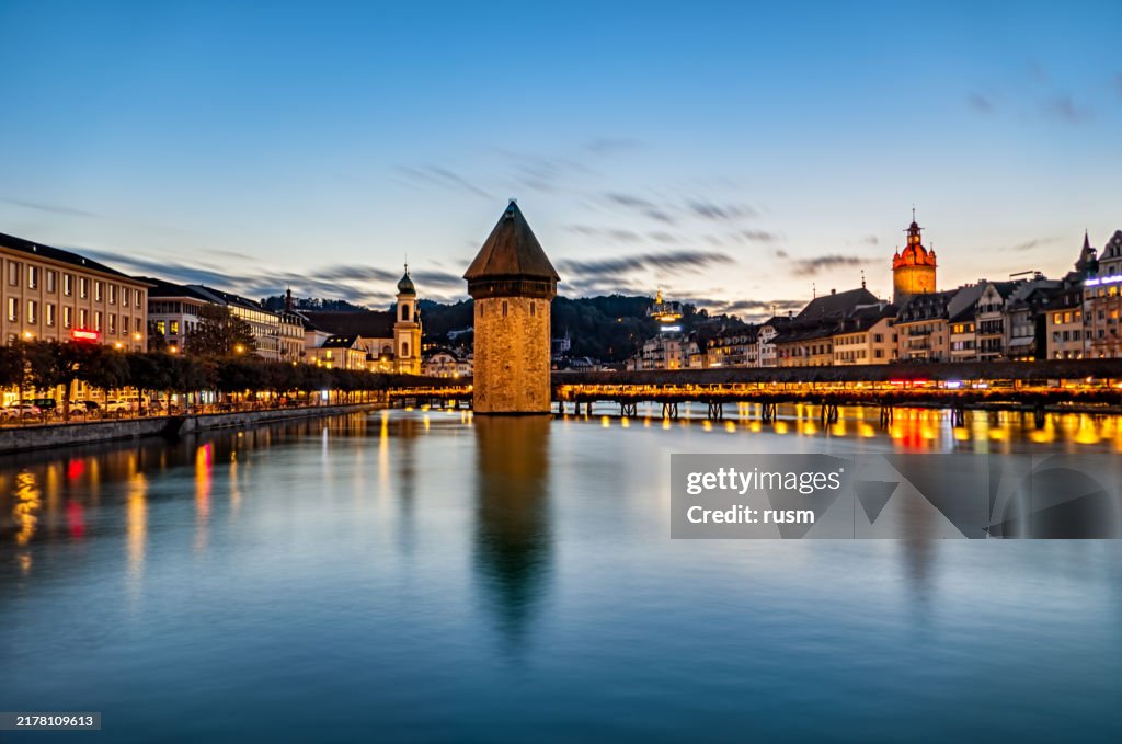 Night long exposure panorama Lucerne old town and and Chapel bridge, Switzerland.