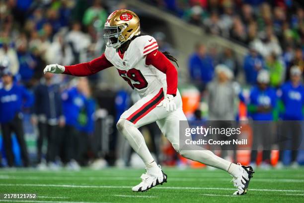 De'Vondre Campbell of the San Francisco 49ers defends in coverage during an NFL football game against the Seattle Seahawks at Lumen Field on October...