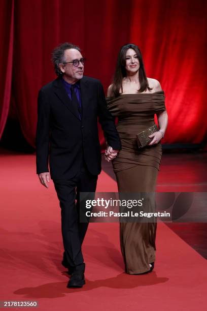 Tim Burton and Monica Bellucci attend the opening ceremony during the 16th Film Festival Lumiere In Lyon on October 12, 2024 in Lyon, France.
