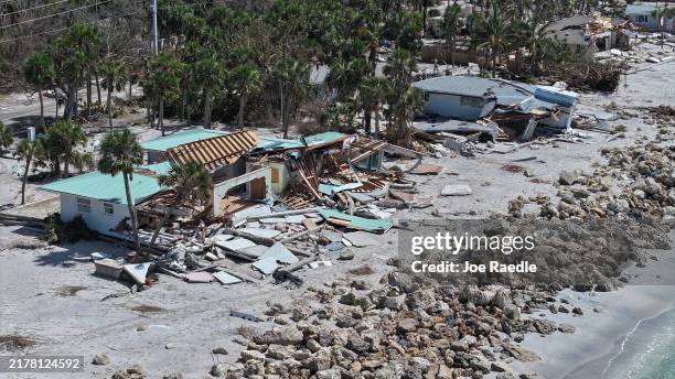 In an aerial view, homes along the Gulf of Mexico are seen after they were destroyed when Hurricane Milton passed through the area on October 12 in...