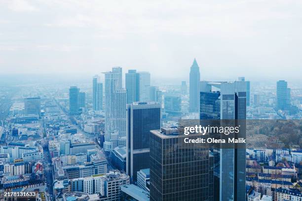 modern city skyline with high-rise buildings in frankfurt, germany - frankfurt am main stock-fotos und bilder