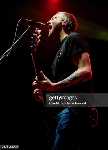 Billy Lunn of The Subways performs at Victoria Warehouse on October 12, 2024 in Manchester, England.