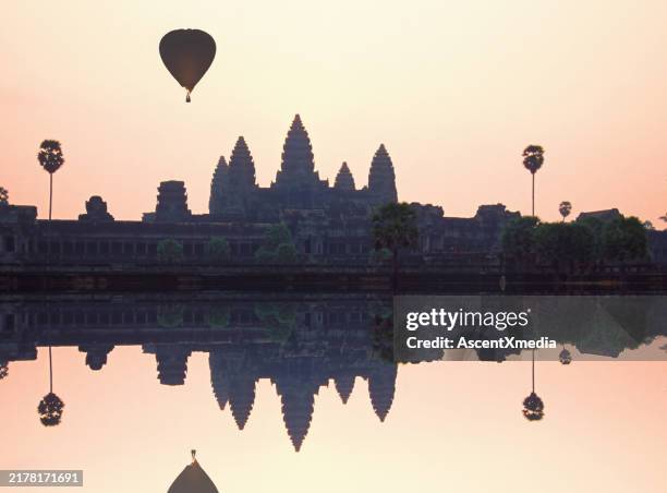 angkor wat with hot air balloons - angkor wat stock pictures, royalty-free photos & images