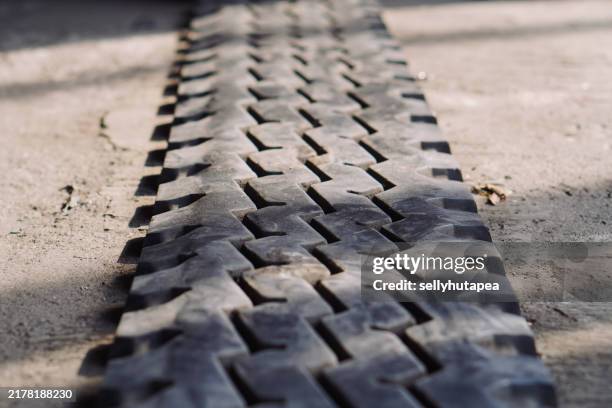 tread patterns: the design of off-road tires - atv tire stock pictures, royalty-free photos & images