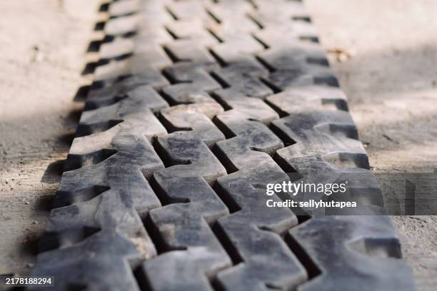 tread patterns: the design of off-road tires - atv tire stock pictures, royalty-free photos & images