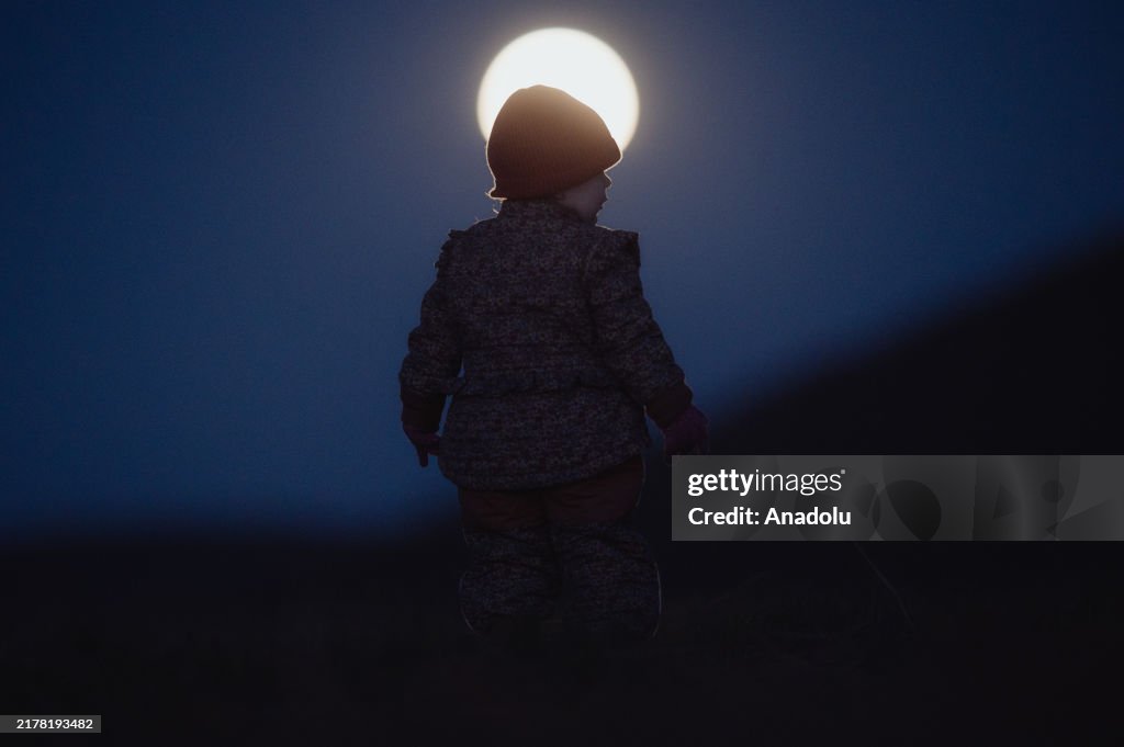 Supermoon rises above sleepy village in Hungary