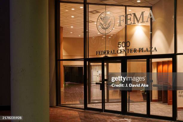 The entrance to the U.S. Federal Emergency Management Agency is lit late into the evening on October 12 in Washington, DC.