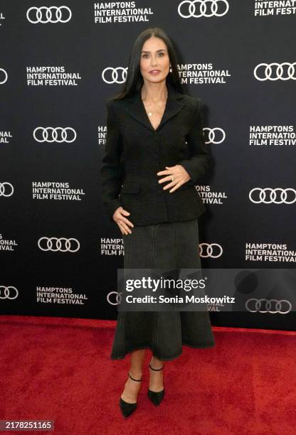 Demi Moore poses on the red carpet before her conversation at the 2024 Hamptons Film Festival on October 13, 2024 in East Hampton, New York.