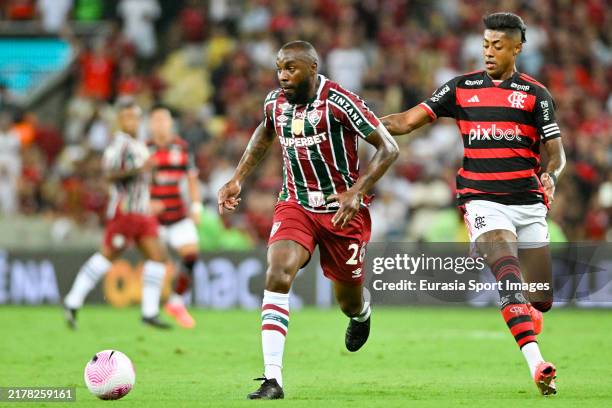Manoel Messias of Fluminense is chased by Bruno Henrique of Flamengo during the match between Flamengo and Fluminense at Maracana Stadium on October...