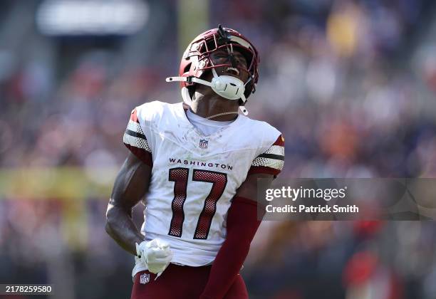 Terry McLaurin of the Washington Commanders celebrates after scoring a touchdown against the Baltimore Ravens during the fourth quarter at M&T Bank...