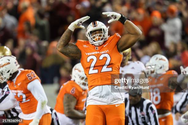 Kelvin Gilliam Jr. #22 of the Virginia Tech Hokies reacts in the first half during a game against the Boston College Eagles at Lane Stadium on...
