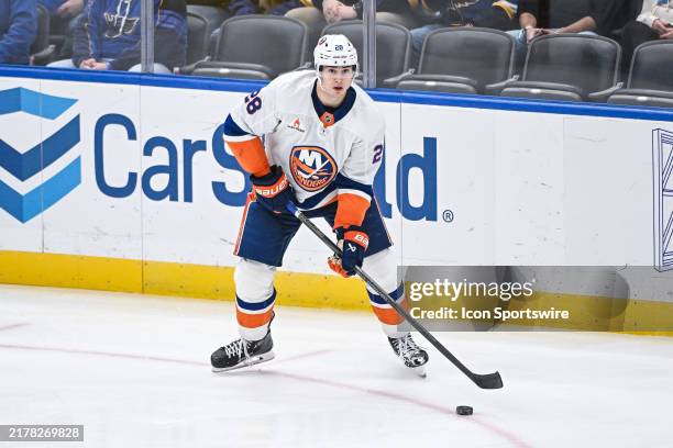 New York Islanders defenseman Alexander Romanov looks for a play to develop during a regular season between the St. Louis Blues and the New York...