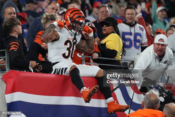 Chase Brown of the Cincinnati Bengals celebrates a touchdown during the second half against the New York Giants at MetLife Stadium on October 13,...