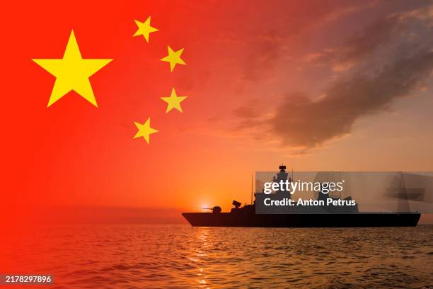 warship on the background of the chinese flag - buque de guerra fotografías e imágenes de stock