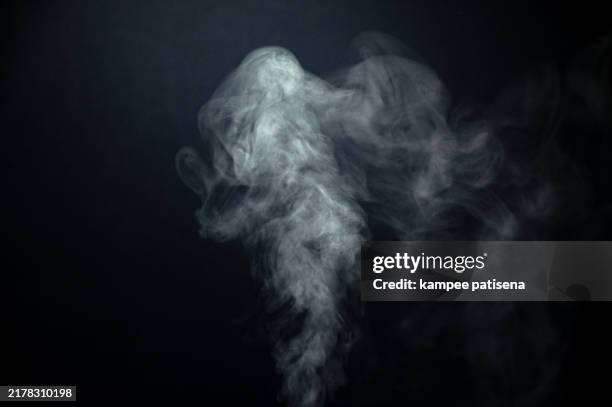 white smoke against black background - fire transparent stock pictures, royalty-free photos & images