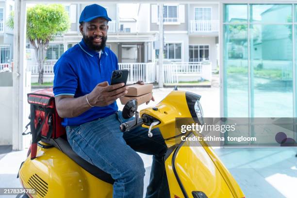 African Delivery Rider 124 African Delivery Motorbike Stock Photos, High-Res Pictures, and ...