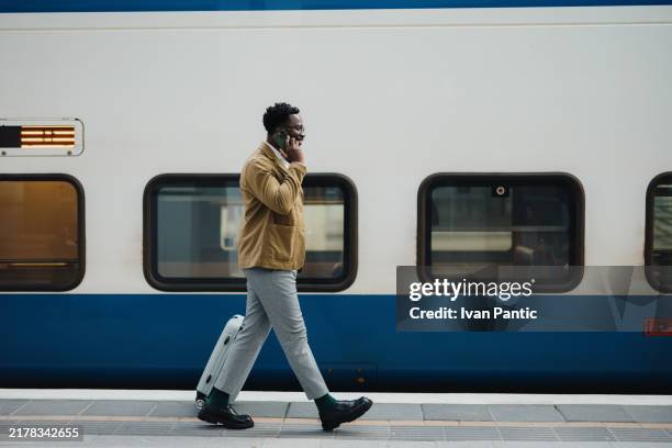 business, travel and work phone call - modern ski lodge stock pictures, royalty-free photos & images