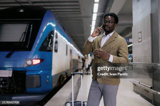 business, travel and work phone call - modern ski lodge stock pictures, royalty-free photos & images
