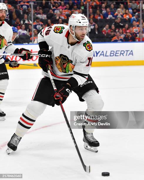 Jason Dickinson of the Chicago Blackhawks in action during the game against the Edmonton Oilers at Rogers Place on October 12 in Edmonton, Alberta,...