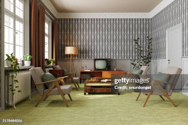 retro living room with armchairs, vintage television, coffee table and floor lamp - estilo moderno de meados do século imagens e fotografias de stock