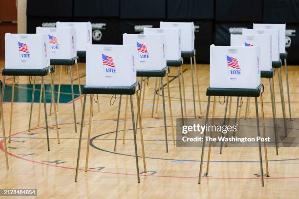 Empty voting booths are seen in the polling station at Davidsonville Elementary School on Tuesday, May 14, 2024 in Davidsonville, MD.