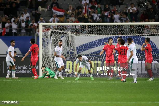 Ibrahim Bayesh of Iraq scores the team's second goal during the FIFA World Cup Asian Third Qualifier Group B match between South Korea and Iraq at...