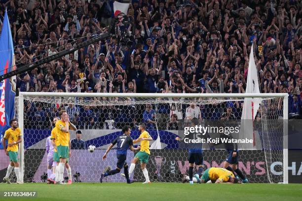 Cameron Burgess of Australia shows dejection after scoring an own goal to make it the first goal for Japan during the FIFA World Cup Asian Third...