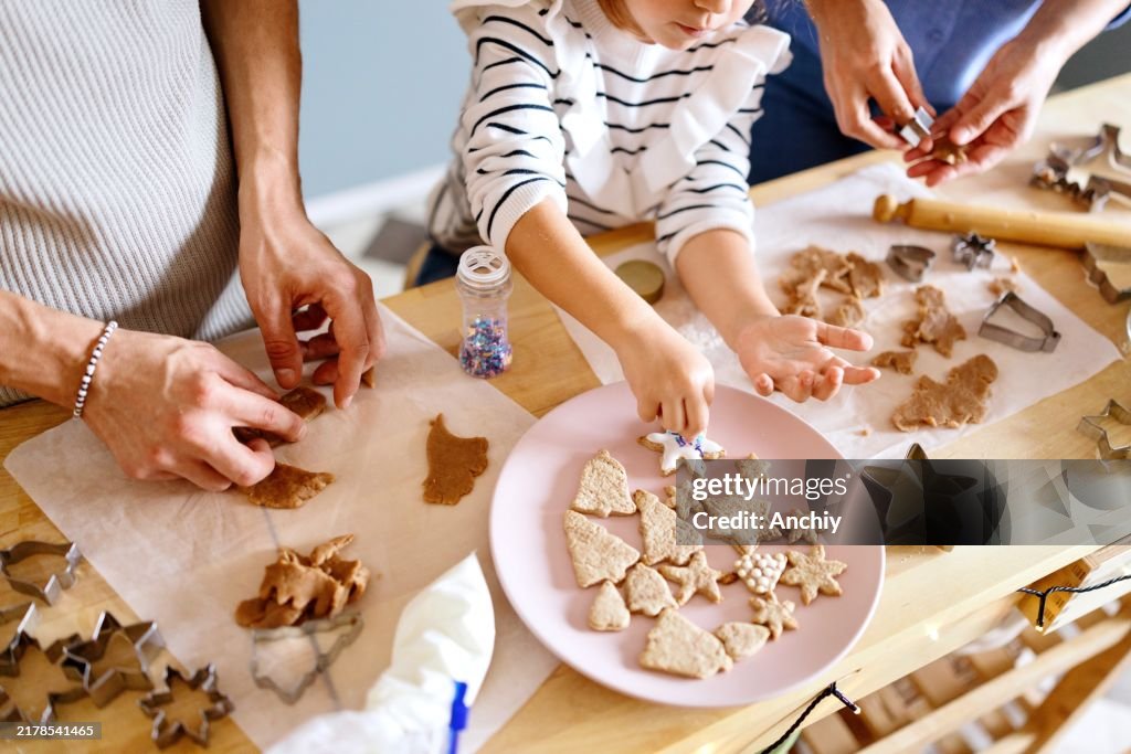 Close-up of a family making cookies from a dough