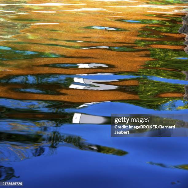 colored reflections in the water - mirror different reflection stock illustrations