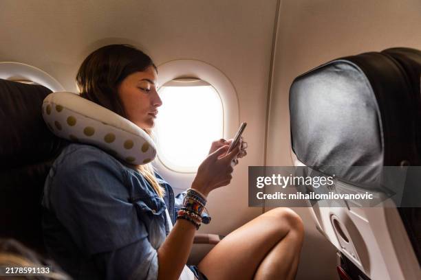 quiet time - neck pillow stock pictures, royalty-free photos & images